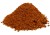 Harissa NMR to pikantna mieszanka przypraw z chilli, czosnkiem i kminem rzymskim. Idealna do mięs, jajek, zup, kuskusu i dipów. 100% naturalna, bez dodatków. Usypana na białym tle prezentując kolor i strukturę przyprawy.